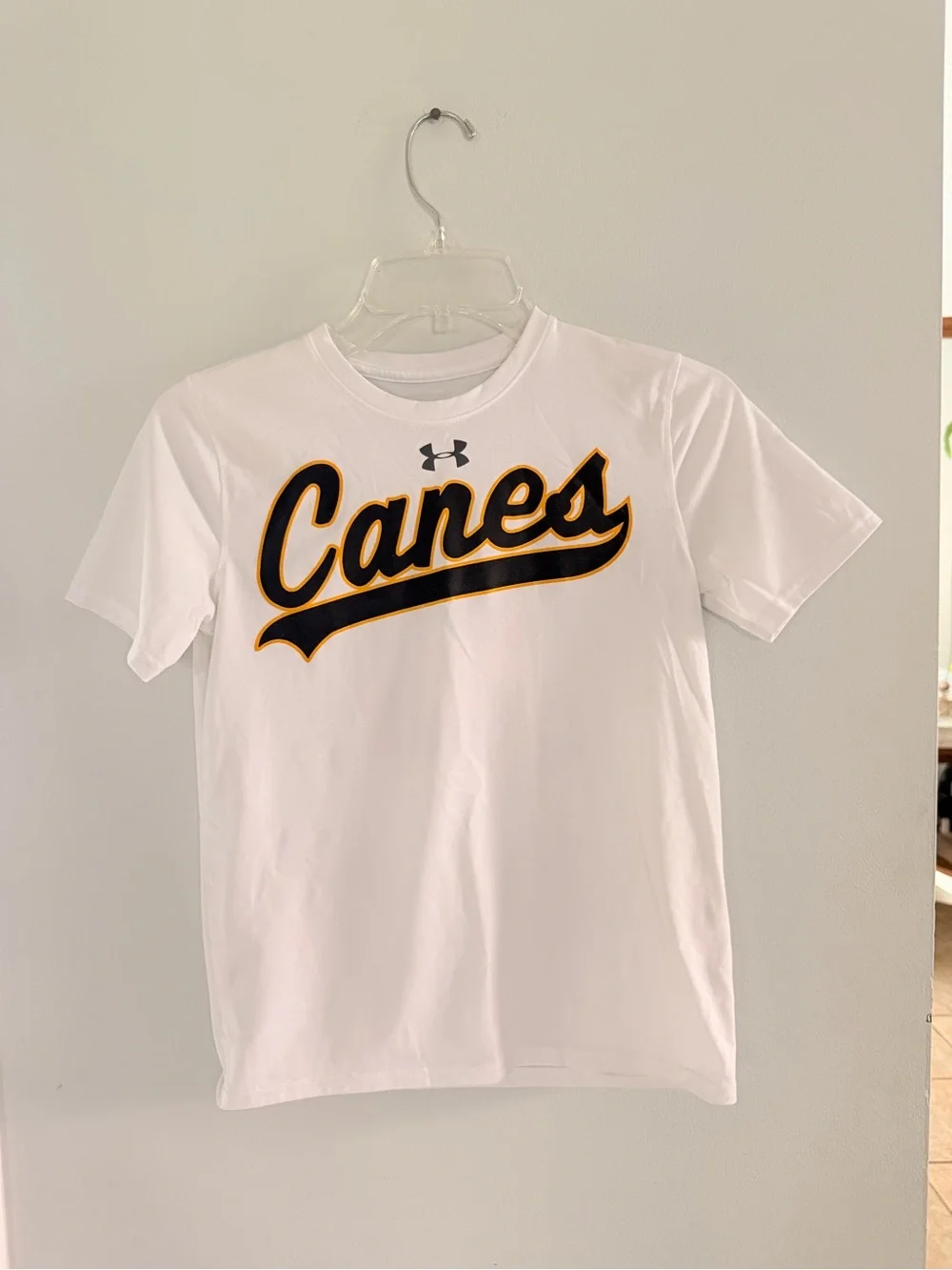 Under Armour White Boys Canes Baseball Shirt with Black Logo